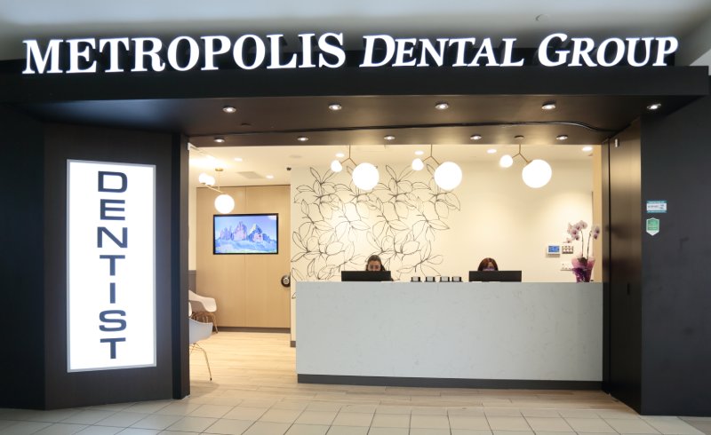 man smiling in dentists chair